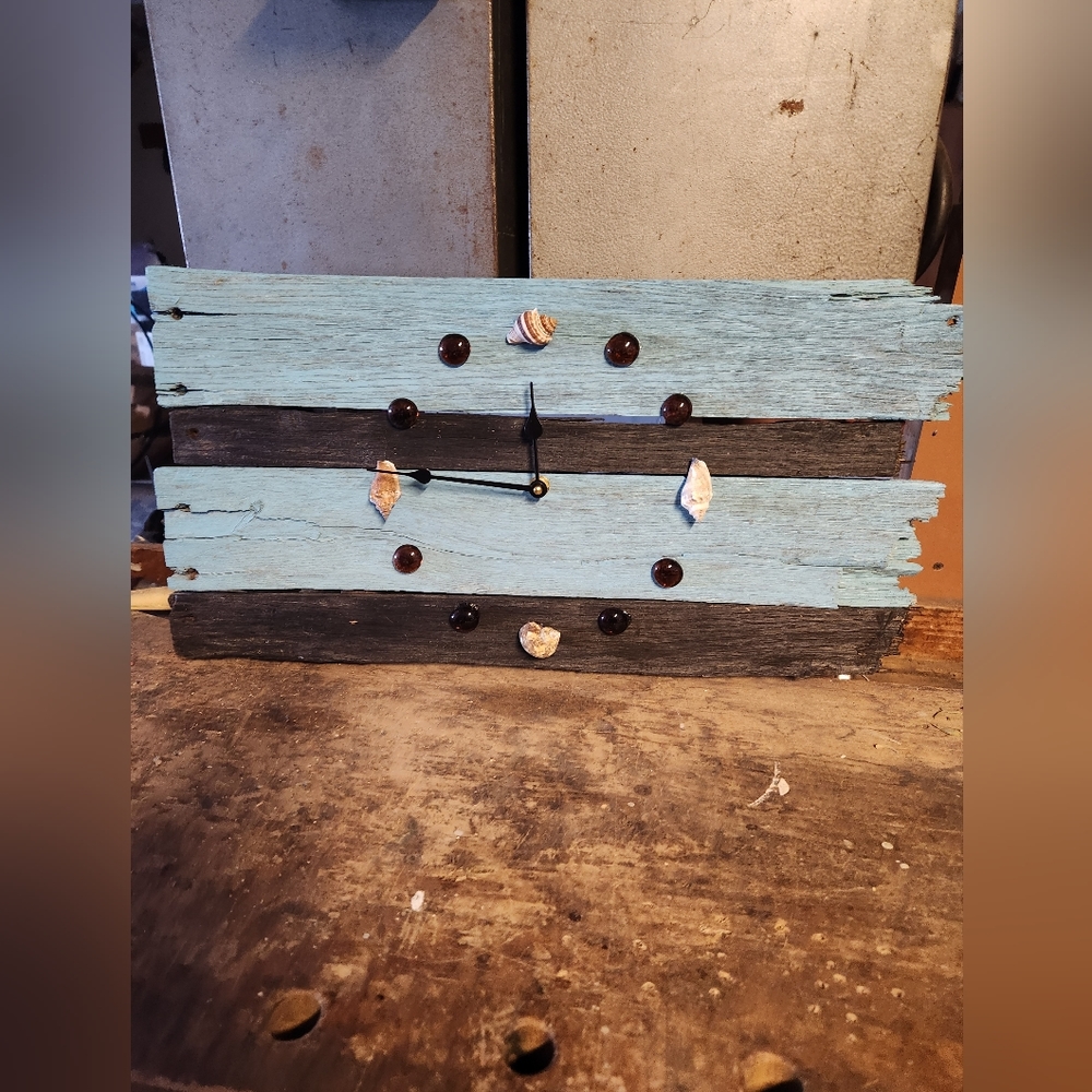 Dark brown and aqua Beach wood wall clock.